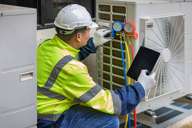 Professional Air Duct Cleaning technician working in North Dighton, MA